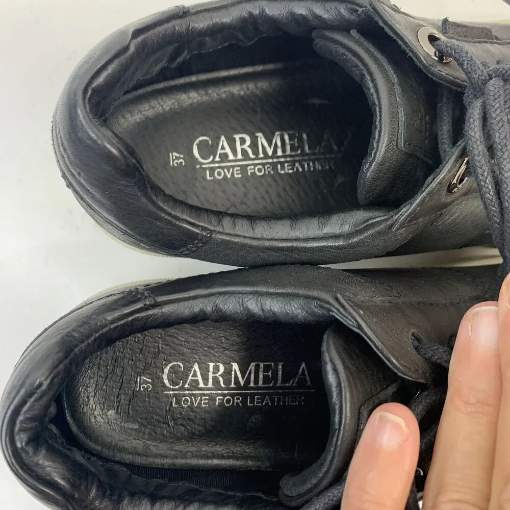 Carmela love leather